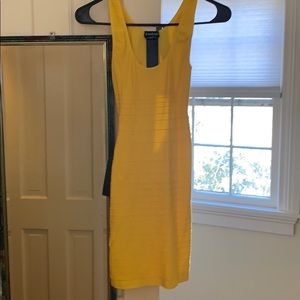 Bebe yellow dress w back cut out
